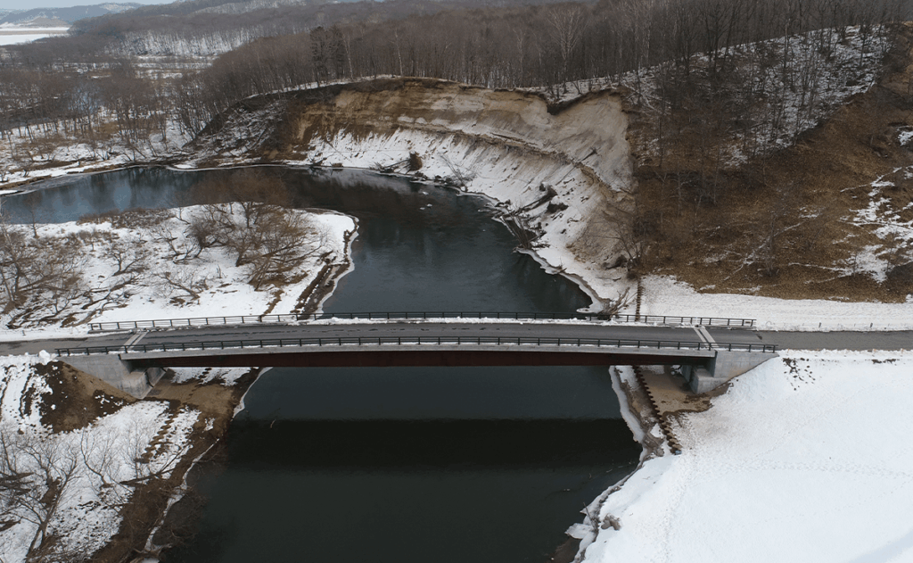 02年災0010号クチョロ原野塘路線災害復旧工事（二本松橋架設・床版工外）
